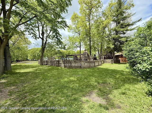 5880 Shaw St, Haslett, MI 48840 - view of yard with a playground
