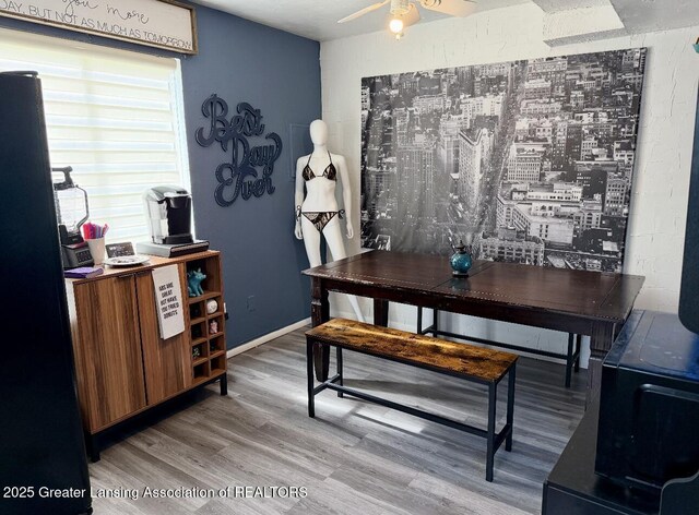 5880 Shaw St, Haslett, MI 48840 - dining area featuring wood finished floors, an office area, and a ceiling fan