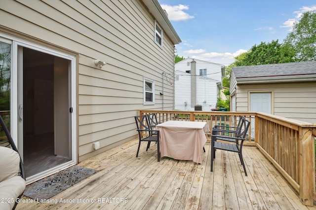 2024 Cogswell Dr, Lansing, MI 48906 - deck with outdoor dining area