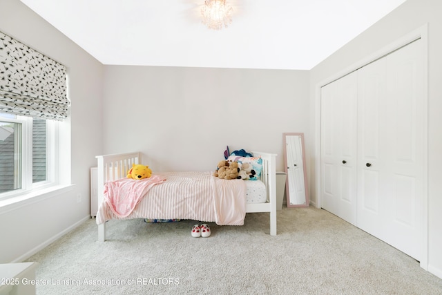 1232 Chemung Forest Dr, Howell, MI 48843 - carpeted bedroom featuring baseboards and a closet