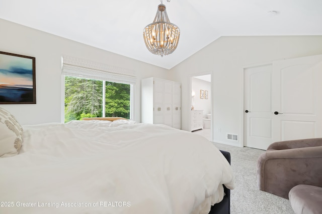 1232 Chemung Forest Dr, Howell, MI 48843 - bedroom featuring carpet floors, vaulted ceiling, a chandelier, ensuite bath, and baseboards