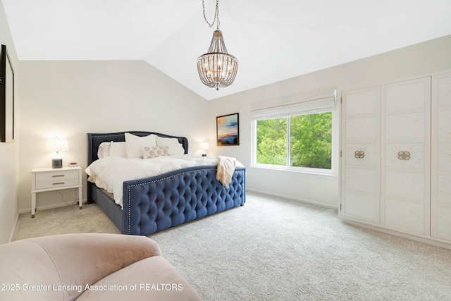 1232 Chemung Forest Dr, Howell, MI 48843 - bedroom with carpet floors, baseboards, a chandelier, and lofted ceiling