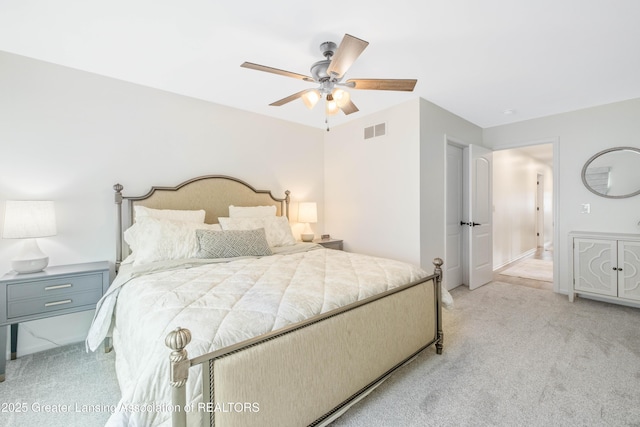 1232 Chemung Forest Dr, Howell, MI 48843 - bedroom with light carpet, a ceiling fan, and baseboards