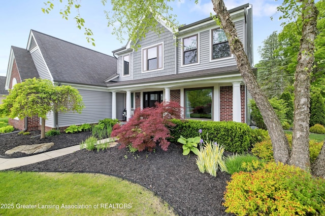 1232 Chemung Forest Dr, Howell, MI 48843 - traditional-style house featuring a shingled roof