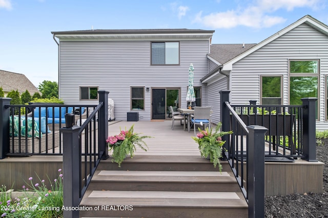 1232 Chemung Forest Dr, Howell, MI 48843 - deck featuring outdoor dining area