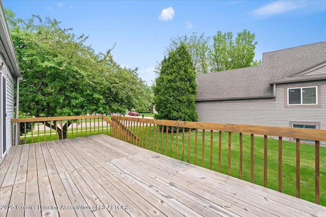 1101 Boulder Ct Unit 48, Lansing, MI 48917 - wooden terrace featuring a lawn