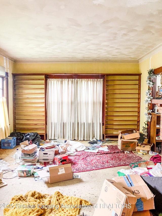908 N Capitol Ave, Lansing, MI 48906 - living room with crown molding and carpet floors