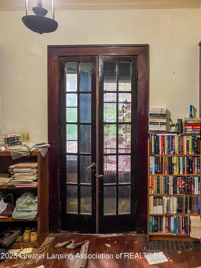 908 N Capitol Ave, Lansing, MI 48906 - detailed view of french doors, crown molding, and wood finished floors