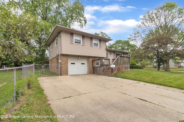 1021 Kendon Dr, Lansing, MI 48910 - view of front of home featuring brick siding, concrete driveway, a garage, a gate, and stairway