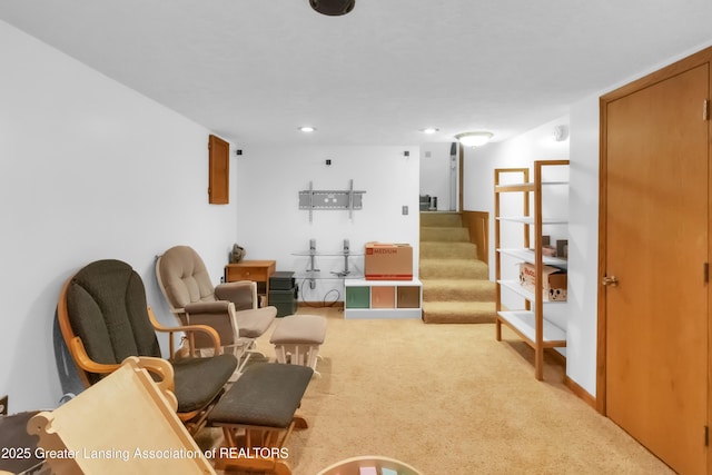 1021 Kendon Dr, Lansing, MI 48910 - living area with carpet floors, stairs, and recessed lighting