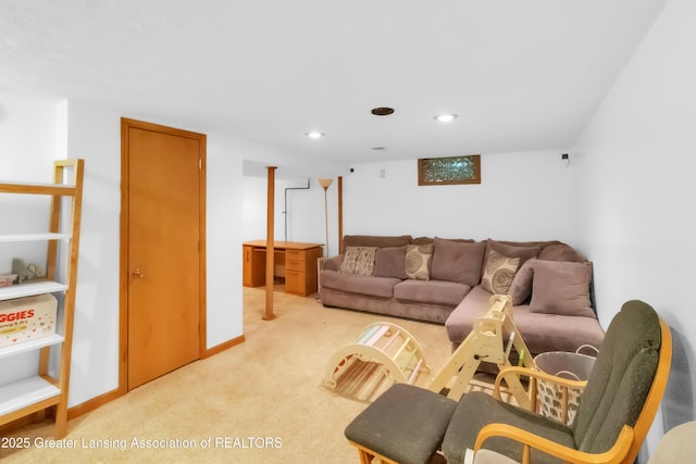 1021 Kendon Dr, Lansing, MI 48910 - living room featuring light colored carpet and recessed lighting
