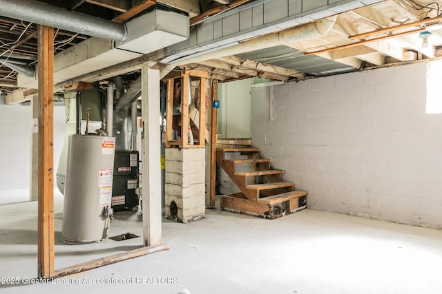 621 Ridgewood Ave, Lansing, MI 48910 - below grade area with gas water heater and stairs
