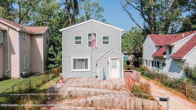 621 Ridgewood Ave, Lansing, MI 48910 - view of front of property featuring a wooden deck and a fenced backyard
