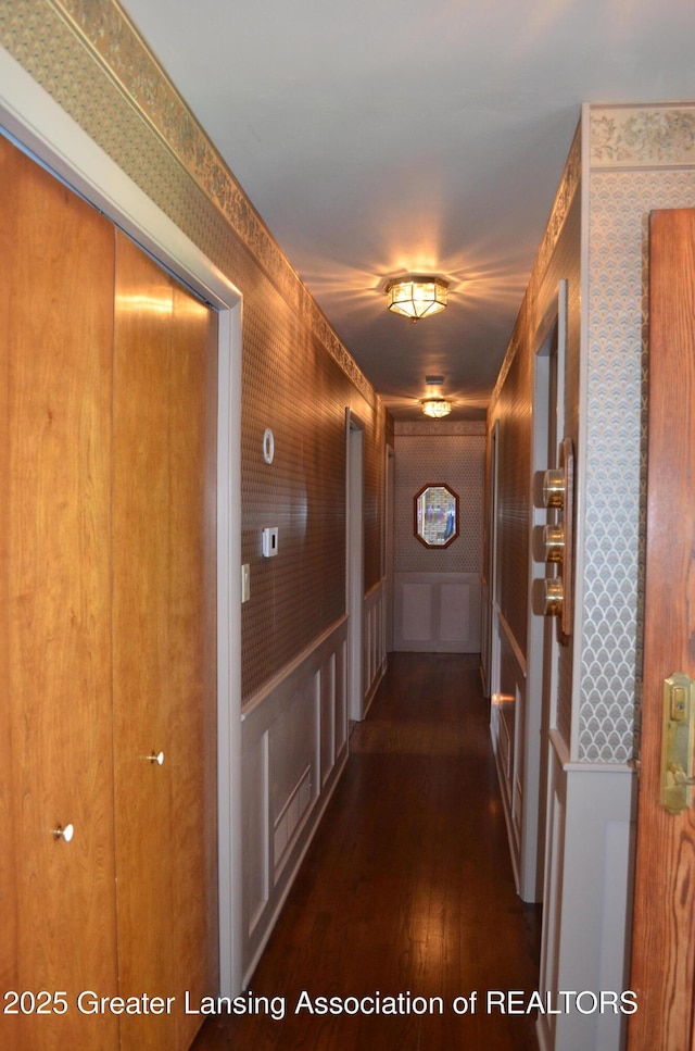 1161 Rebecca Rd, East Lansing, MI 48823 - hallway featuring wallpapered walls and dark wood-style floors