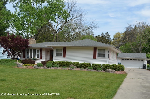 1161 Rebecca Rd, East Lansing, MI 48823 - ranch-style home featuring a front yard, an outdoor structure, a chimney, driveway, and roof with shingles