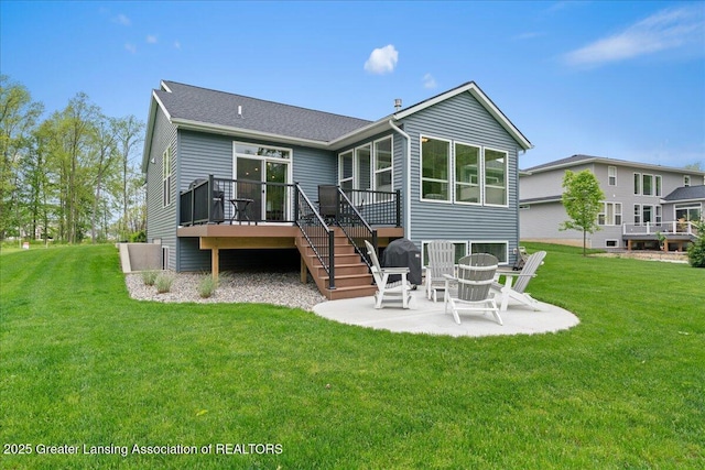 6619 Windford Ln, Grand Ledge, MI 48837 - back of property featuring a wooden deck, a patio area, stairway, and a yard