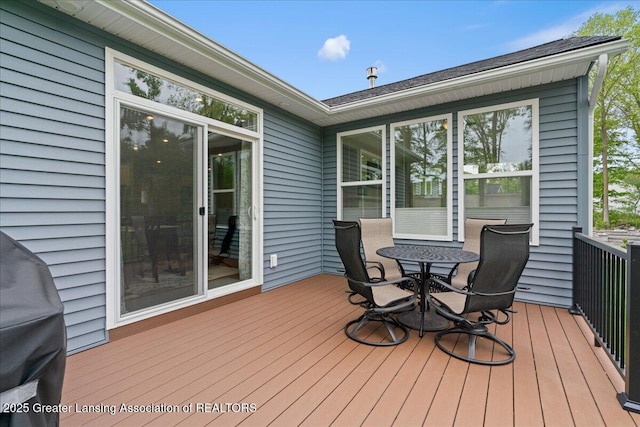 6619 Windford Ln, Grand Ledge, MI 48837 - deck with outdoor dining area