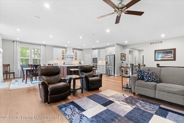 6619 Windford Ln, Grand Ledge, MI 48837 - living area with light wood-type flooring, recessed lighting, and a ceiling fan