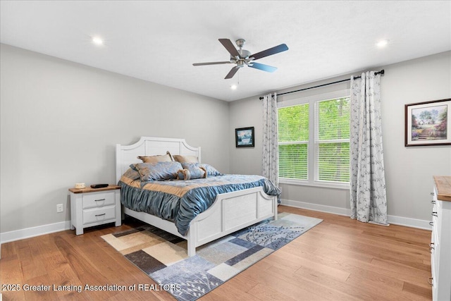 6619 Windford Ln, Grand Ledge, MI 48837 - bedroom featuring light wood-type flooring, baseboards, recessed lighting, and a ceiling fan