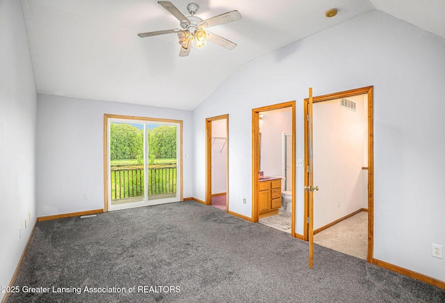 3037 Hawley Rd, Leslie, MI 49251 - unfurnished bedroom with vaulted ceiling, access to exterior, baseboards, carpet floors, and ensuite bath