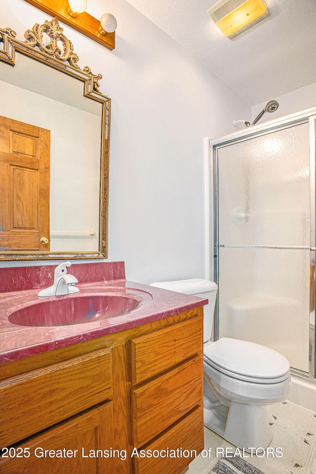 3037 Hawley Rd, Leslie, MI 49251 - full bath featuring vanity, toilet, and a shower stall