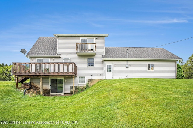3037 Hawley Rd, Leslie, MI 49251 - rear view of house with a yard, a deck, a balcony, and a shingled roof