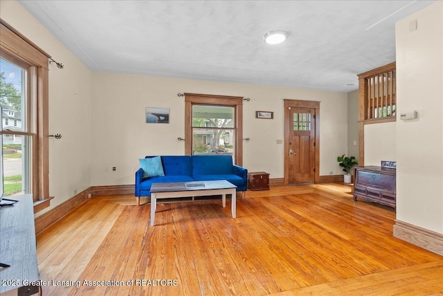 329 Smith Ave, Lansing, MI 48910 - living room with light wood-type flooring and baseboards