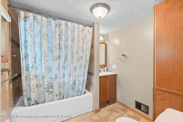 329 Smith Ave, Lansing, MI 48910 - full bathroom with toilet, shower / tub combo, a textured ceiling, tile patterned flooring, and vanity