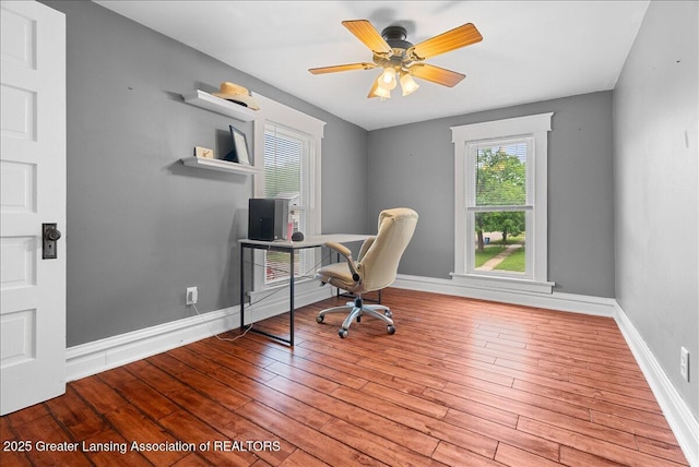 329 Smith Ave, Lansing, MI 48910 - office with wood finished floors, baseboards, and ceiling fan