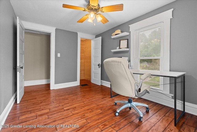 329 Smith Ave, Lansing, MI 48910 - office with baseboards, wood finished floors, and a ceiling fan