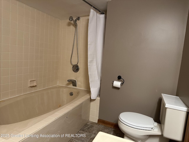 710 Gainsborough Dr, East Lansing, MI 48823 - bathroom featuring toilet and a combined bath / shower with jetted tub