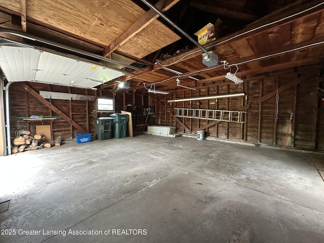 710 Gainsborough Dr, East Lansing, MI 48823 - garage with a garage door opener