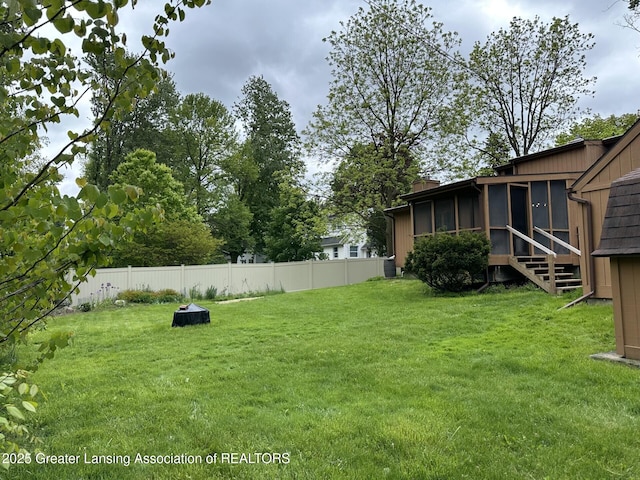 710 Gainsborough Dr, East Lansing, MI 48823 - view of yard with a sunroom