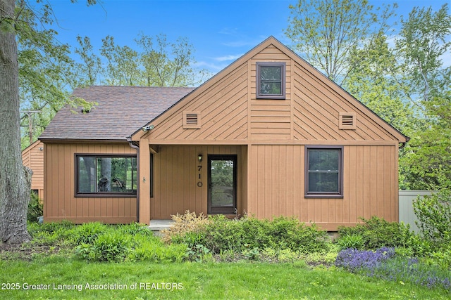 710 Gainsborough Dr, East Lansing, MI 48823 - view of front of home featuring roof with shingles