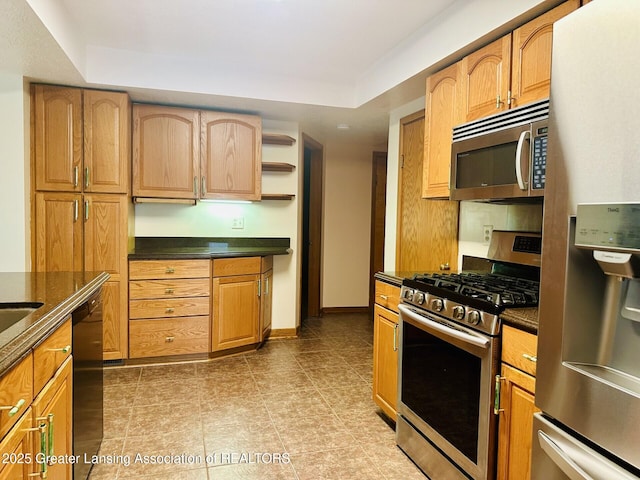 710 Gainsborough Dr, East Lansing, MI 48823 - kitchen featuring stainless steel appliances, open shelves, light tile patterned flooring, and a tray ceiling