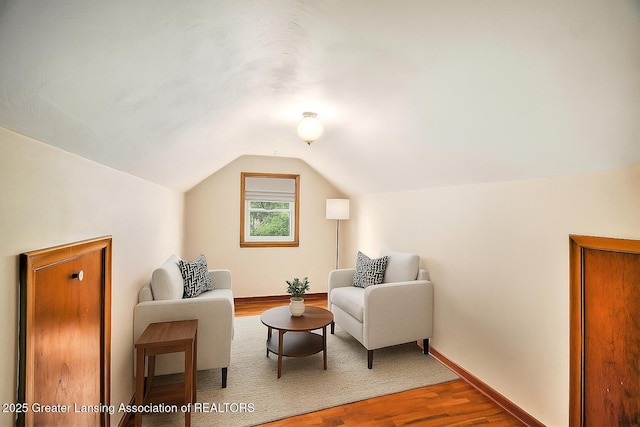 710 Gainsborough Dr, East Lansing, MI 48823 - living area featuring wood finished floors and lofted ceiling