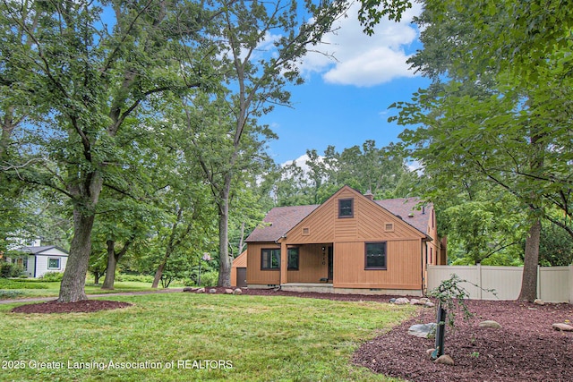 710 Gainsborough Dr, East Lansing, MI 48823 - view of front of home with roof with shingles and a porch