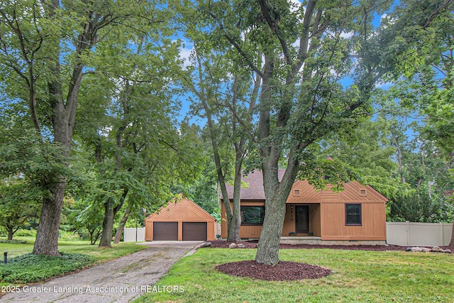 710 Gainsborough Dr, East Lansing, MI 48823 - view of front facade featuring a garage and crawl space