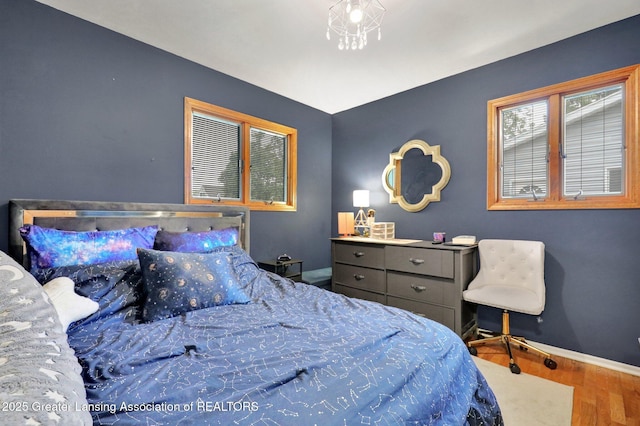 1580 Grayfriars Ave, Holt, MI 48842 - bedroom featuring wood finished floors and baseboards