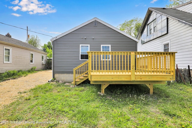 209 Haze St, Lansing, MI 48917 - rear view of property with a wooden deck