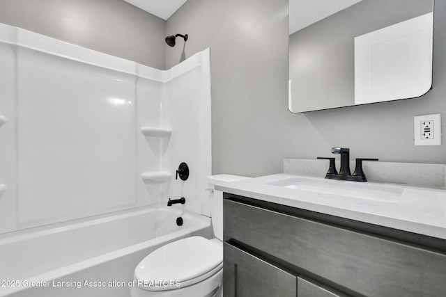 209 Haze St, Lansing, MI 48917 - full bath featuring vanity, bathtub / shower combination, and toilet