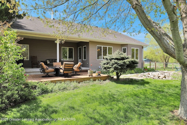 4740 Round Lake Rd, Laingsburg, MI 48848 - rear view of house featuring a deck