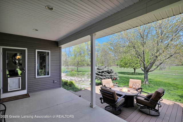 4740 Round Lake Rd, Laingsburg, MI 48848 - view of patio featuring an outdoor fire pit and a deck