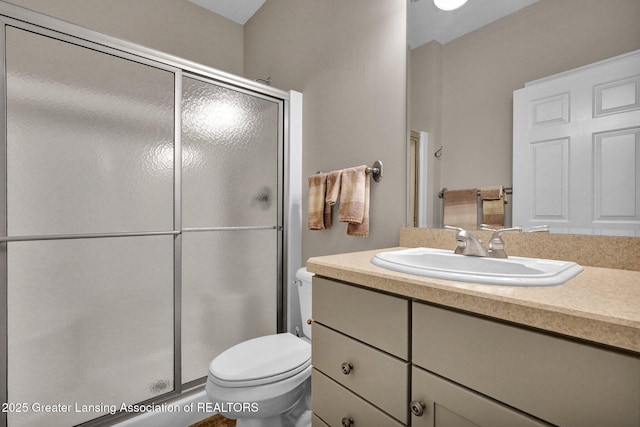 4740 Round Lake Rd, Laingsburg, MI 48848 - bathroom with toilet, a stall shower, and vanity