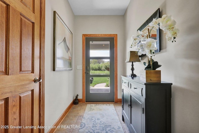4740 Round Lake Rd, Laingsburg, MI 48848 - entryway featuring light tile patterned floors and baseboards