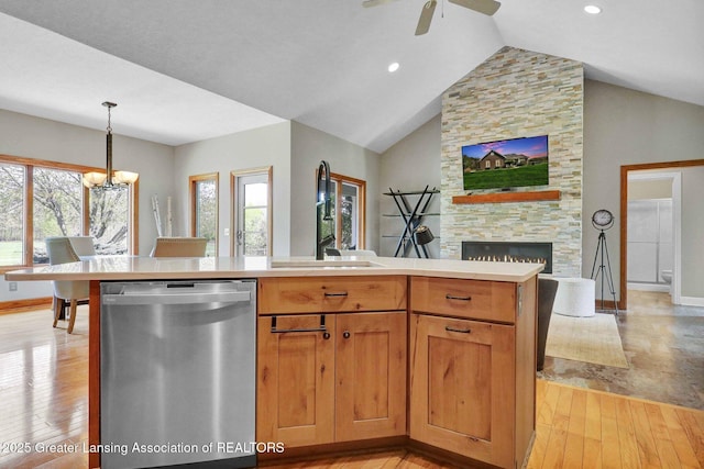 4740 Round Lake Rd, Laingsburg, MI 48848 - kitchen with stainless steel dishwasher, light wood-type flooring, a sink, baseboards, and recessed lighting