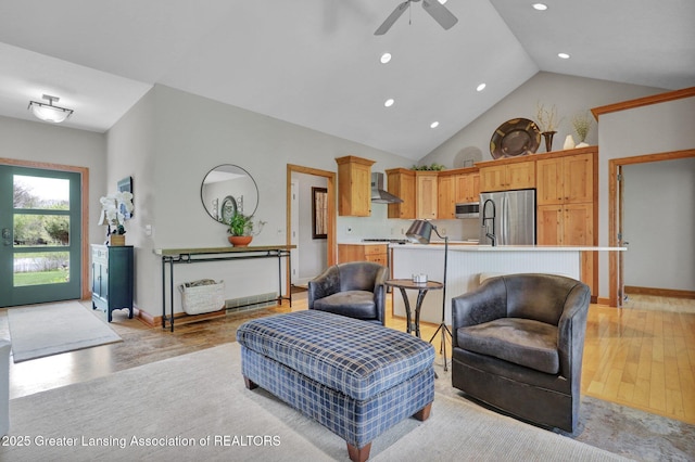 4740 Round Lake Rd, Laingsburg, MI 48848 - living room featuring light wood-type flooring, ceiling fan, recessed lighting, baseboards, and high vaulted ceiling