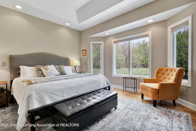 4740 Round Lake Rd, Laingsburg, MI 48848 - bedroom with recessed lighting, wood finished floors, and baseboards