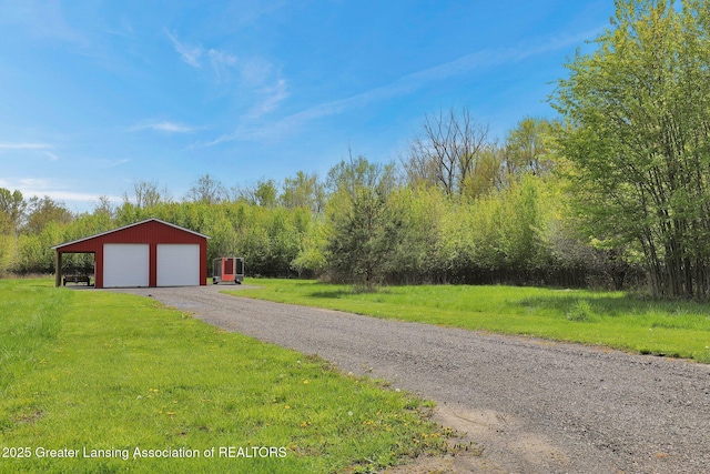 4740 Round Lake Rd, Laingsburg, MI 48848 - view of dirt / gravel road featuring a pole building