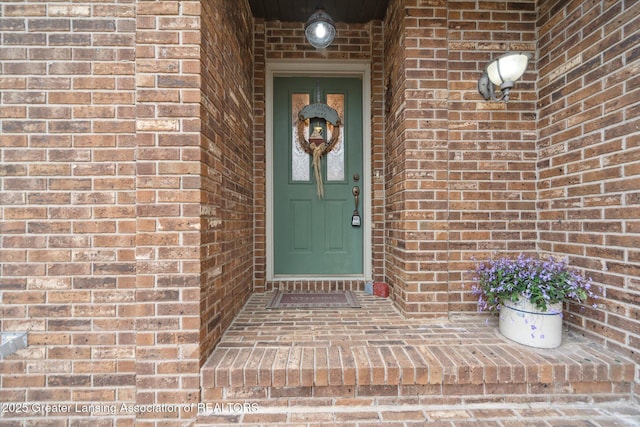 10949 Lakeside Dr, Perrinton, MI 48871 - property entrance featuring brick siding